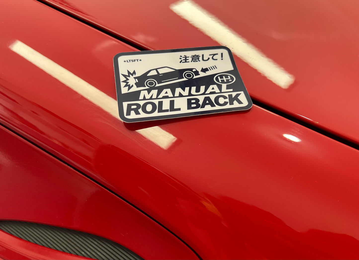 Roll Back Sticker
